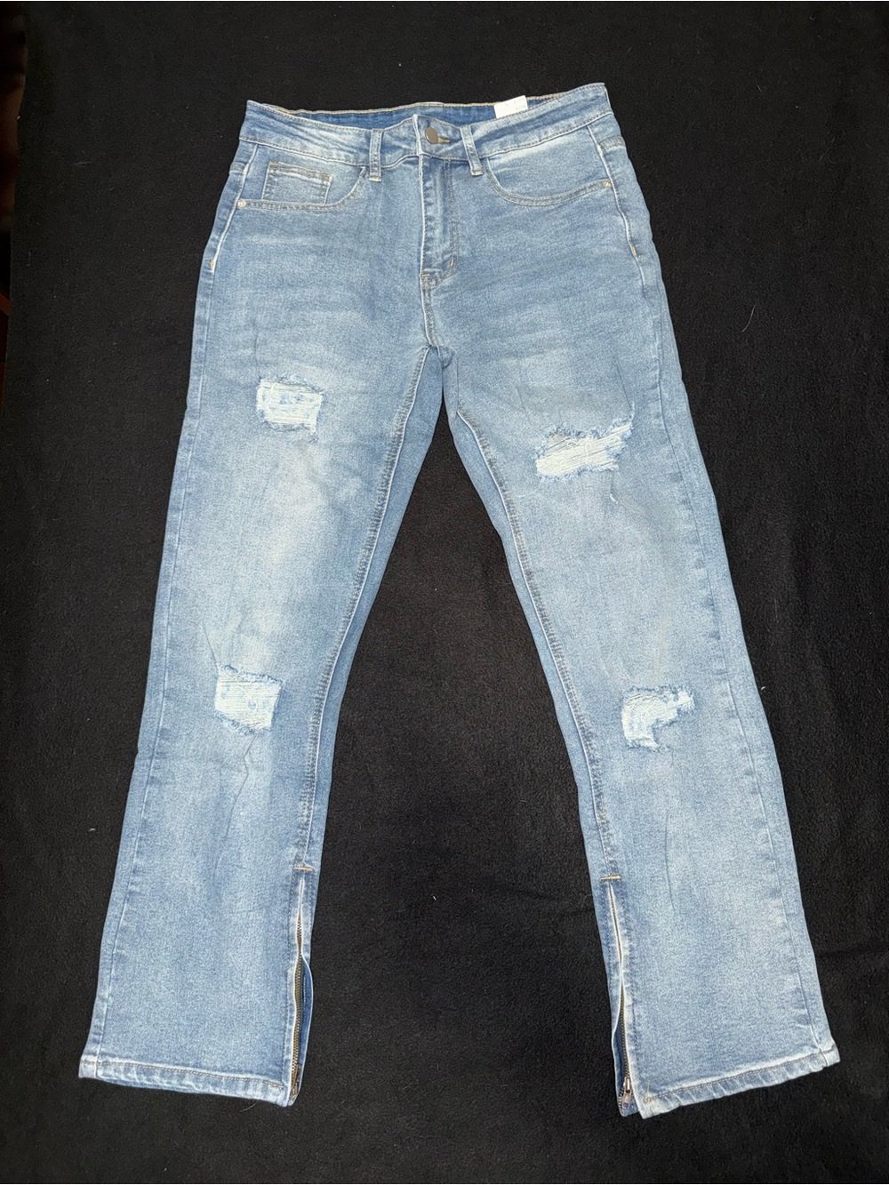 Women’s  Light Blue Distressed Jeans